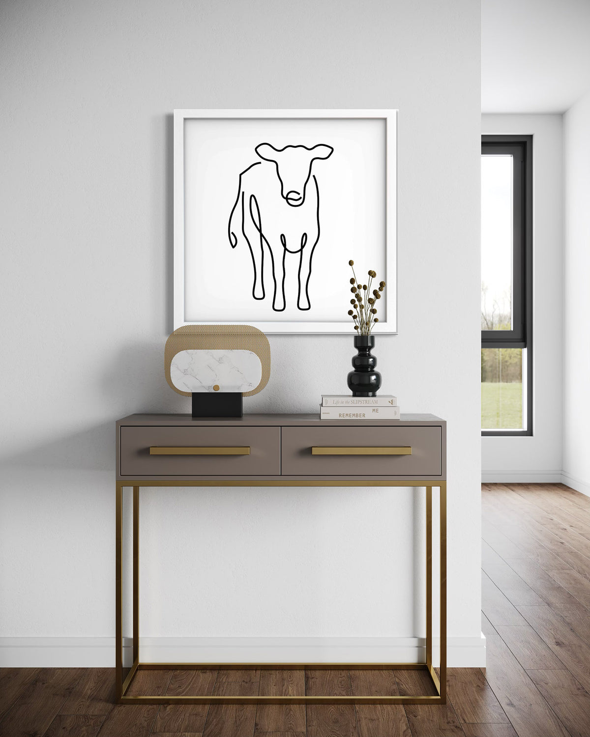 Cow framed art print displayed in a second styled room setting