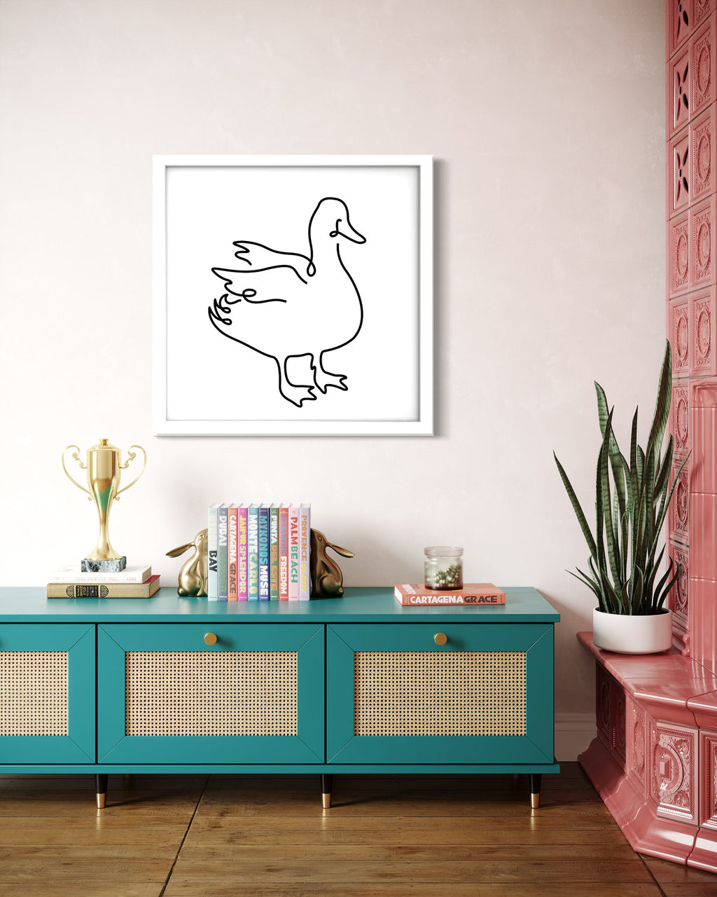 Duck framed art print displayed in a styled room setting