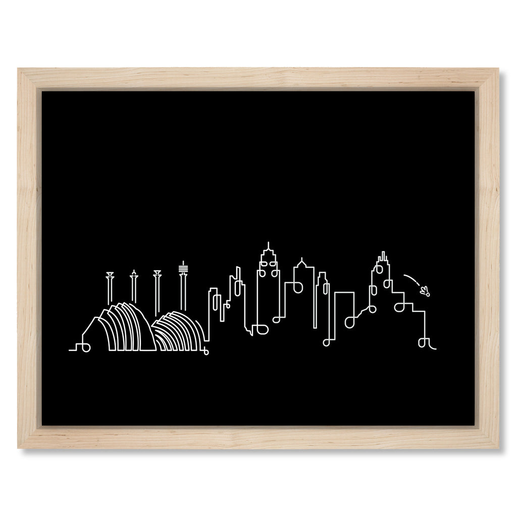 Kansas City Skyline Night art print mockup in a black frame
